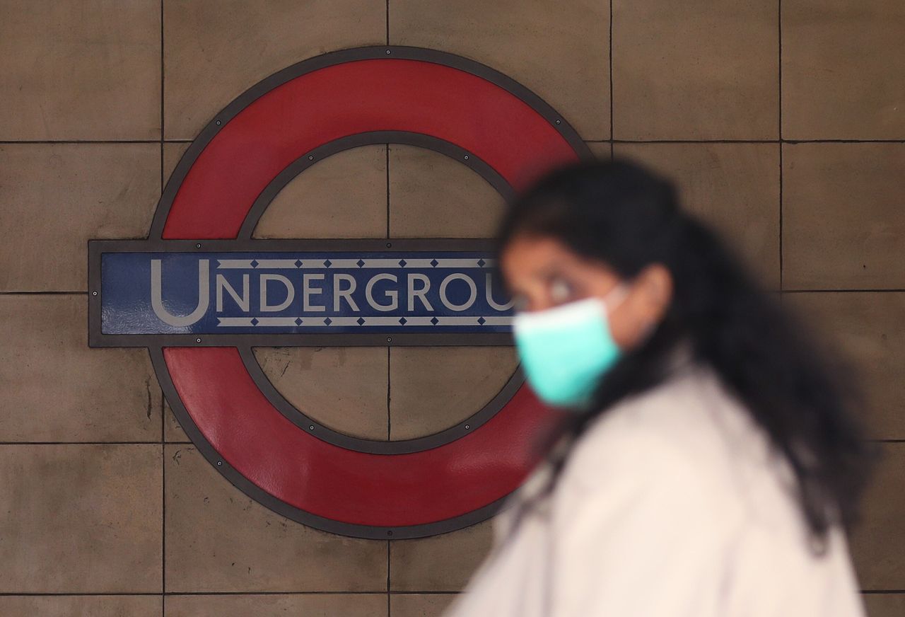A commuter wearing a face mask at Leicester Square London Underground station, after the announcement of plans to bring the country out of lockdown.