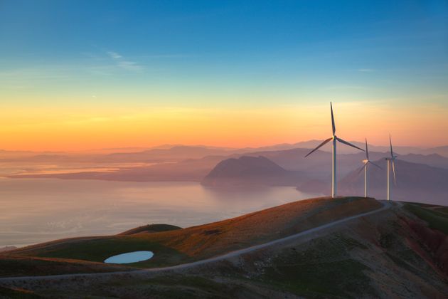 Sunset at the summit of Panachaiko mountain (1,926m) in Patra, West Greece. The mountain is home to Greece's largest Wind Park with 40 Wind Turbines.