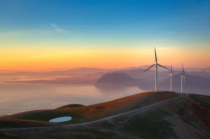 Sunset at the summit of Panachaiko mountain (1,926m) in Patra, West Greece. The mountain is home to Greece's largest Wind Park with 40 Wind Turbines.