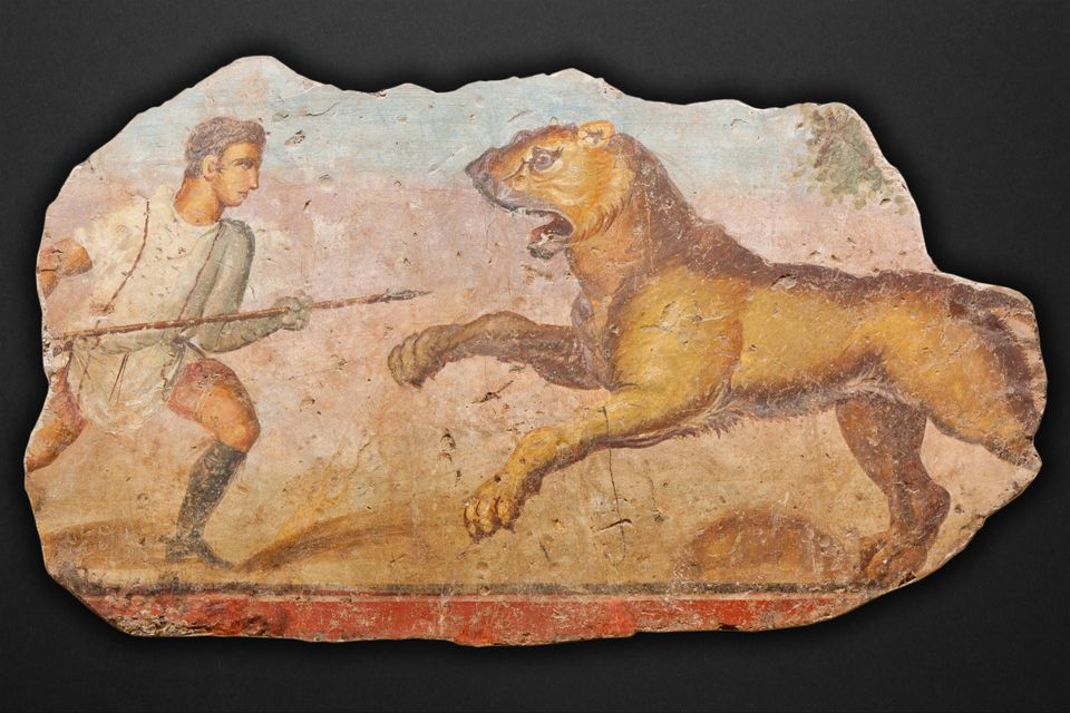 Eνας bestiarius αντιμετωπίζει στην αρένα ένα λιοντάρι. Τοιχογραφία στην Ισπανία