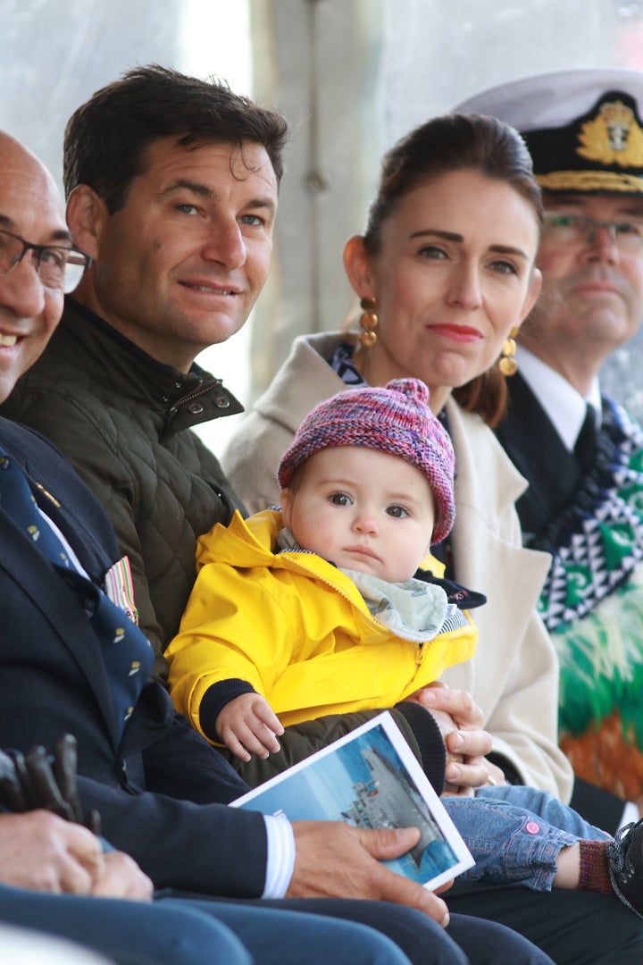 Prime Minister Jacinda Ardern (R) her partner Clarke Gayford (L) and their child Neve pictured in 2019.