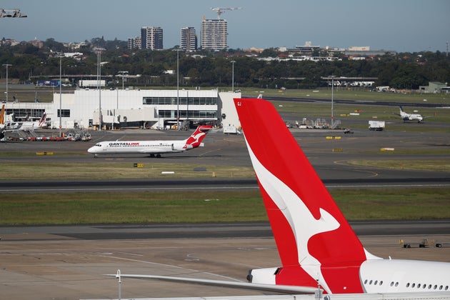 Qantas planes are seen at Kingsford Smith International Airport. REUTERS/Loren Elliott/File Photo
