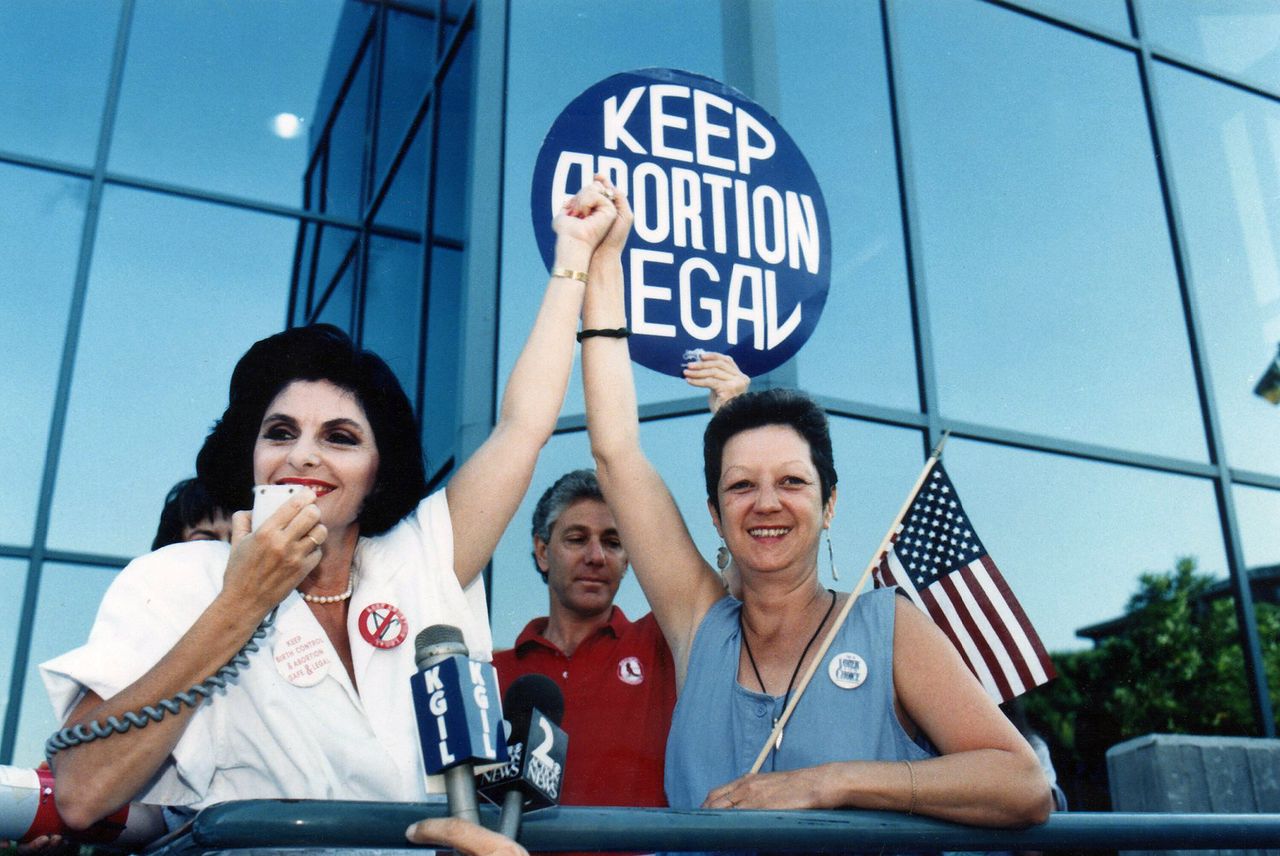 Attorney Gloria Allred and Norma McCorvey at a pro-choice rally in California in July 1989.