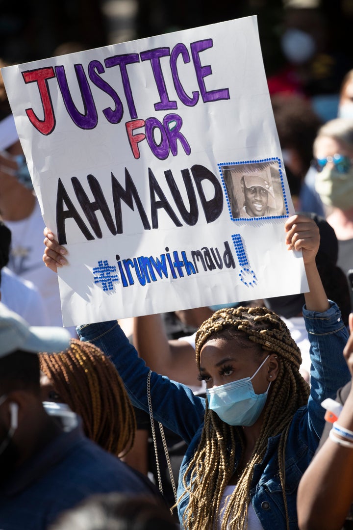 Demonstrators gathered in Brunswick, Georgia, on May 8 to focus attention on and protest the shooting of Ahmaud Arbery on Feb. 23 elsewhere in the state. After the Georgia Bureau of Investigation interceded in the case, two white men -- a father and son -- were charged with murder in early May in Arbery's shooting. Similar charges were filed against a third white man Thursday.