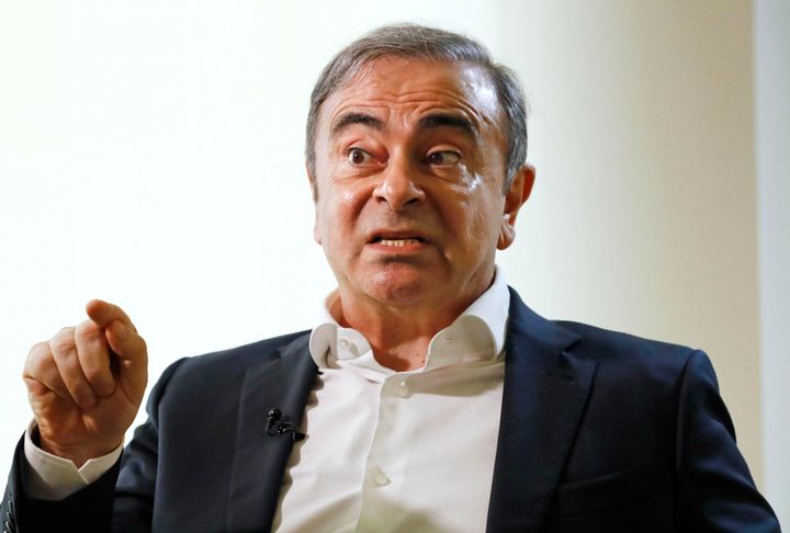 Former Nissan Chairman Carlos Ghosn speaks to Japanese media during an interview in Beirut, Lebanon, Friday, Jan. 10, 2020.