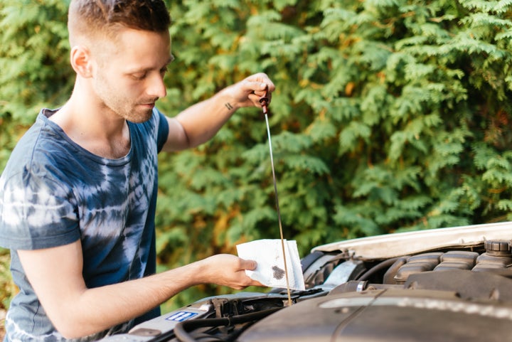 It's not a bad idea to check your car's oil status before heading out.