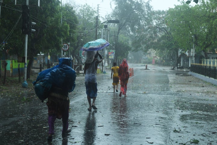 Residents seek shelter ahead of the expected landfall of Cyclone Amphan in Digha, India, on May 20.