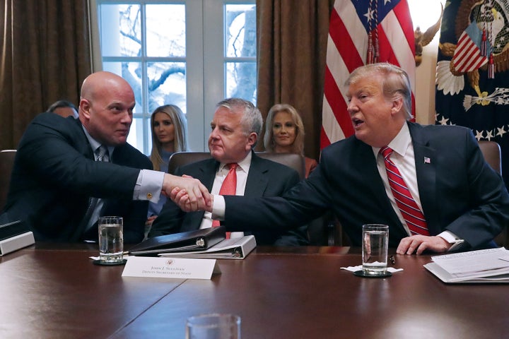 Donald Trump shakes hands with Matthew Whitaker during a Cabinet meeting on Feb. 12, 2019.