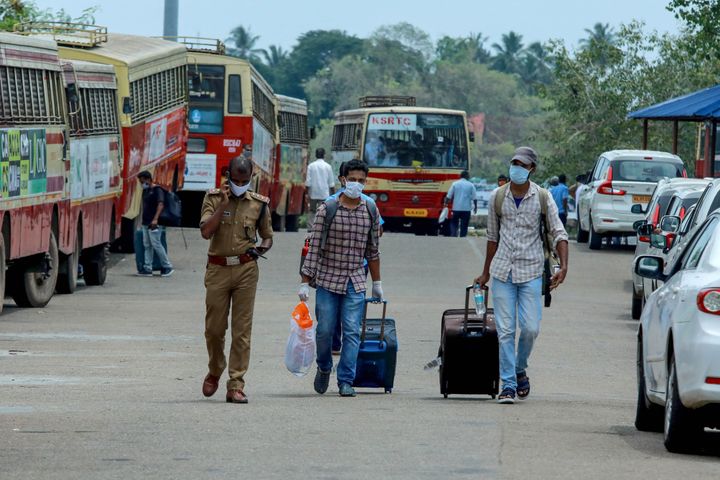 Indian citizens evacuated from Maldives on a special ship being shifted to a quarantine centre by bus in Kochi, Kerala, on May 10, 2020.