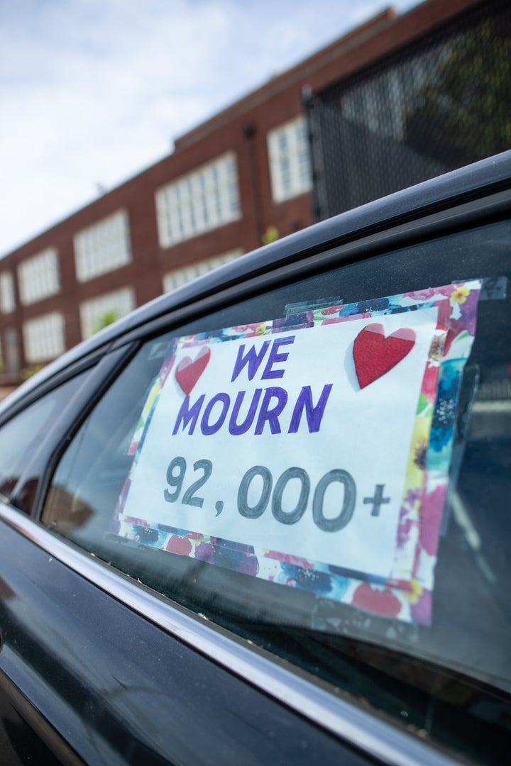 Progressive activists hold a 200-car funeral motorcade through Washington, D.C., on May 20.