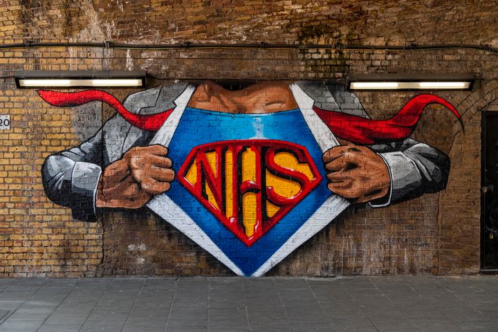 Lionel Stanhope's reworked mural on Cornwall Road under Waterloo East station in London paying tribute to NHS staff. 