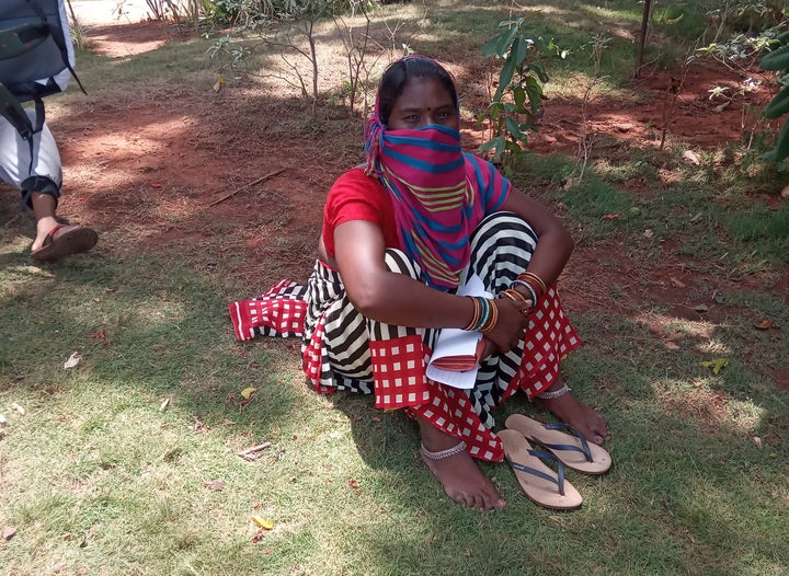 Single mother Narbhadia Bhanwasi waits outside the Collector's office in Panjim. She lost her job as a domestic help and is now living on a building site with her four-year-old son and seven-year-old hearing and speech-challenged daughter. 