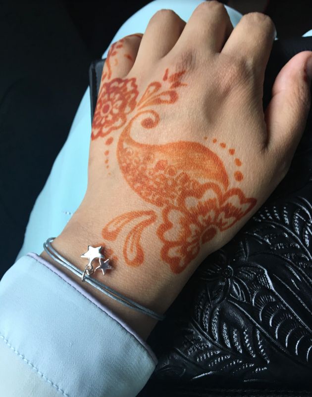 Raisah Ahmed shows her henna-painted hands at a previous Eid