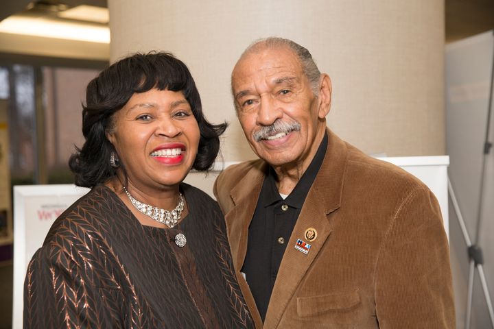 Detroit City Council President Brenda Jones poses with then-Rep. John Conyers Jr. (D-Mich.) in April 2016. Conyers' resignation opened up the House seat that Tlaib now occupies.