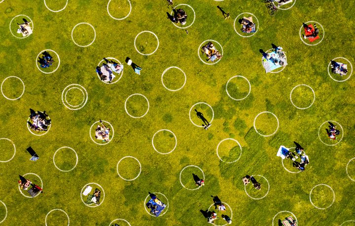 Circles designed to help prevent the spread of the coronavirus by encouraging social distancing in San Francisco's Dolores Park on May 21, 2020. 