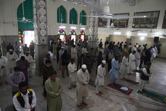 Muslim devotees offer Friday prayers at a mosque during the Islamic holy month of Ramadan in Lahore on...