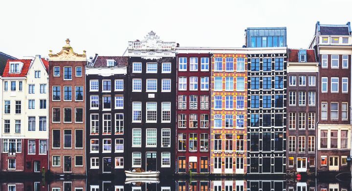 Typical Dutch houses built by the canal, Amsterdam, Netherland