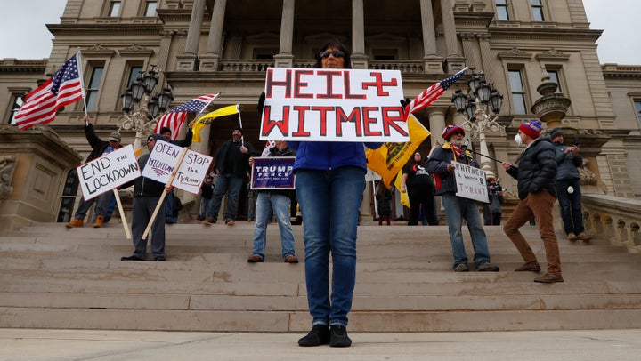 Protesters at the Michigan State Capitol building in Lansing, Michigan.