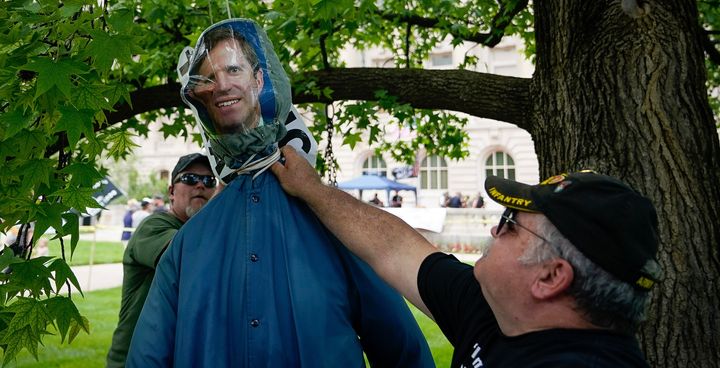 Protesters hang an effigy of Gov. Andy Beshear during a Patriot Day 2nd Amendment Rally in Frankfort, Kentucky.