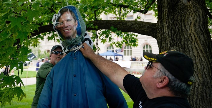 Protesters hang an effigy of Gov. Andy Beshear during a Patriot Day 2nd Amendment Rally in Frankfort, Kentucky.