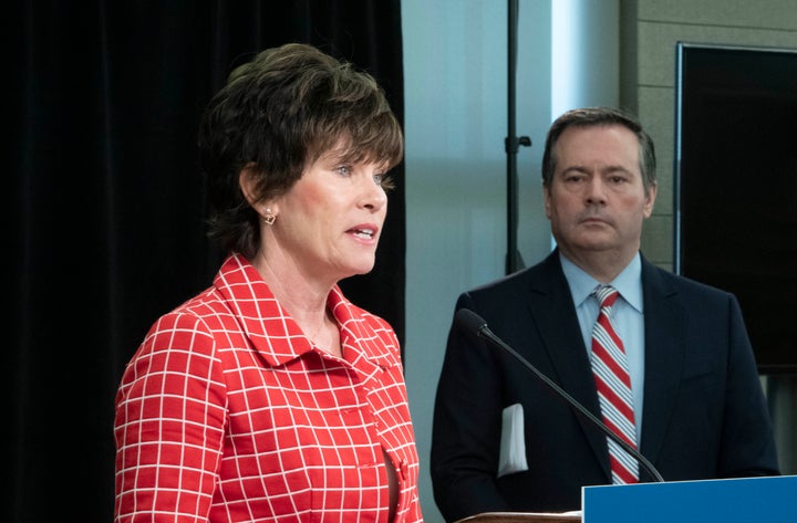 Alberta Premier Jason Kenney and Energy Minister Sonya Savage at a press conference in Edmonton April 24, 2020. Savage recently said the pandemic was a "great time" to build the Trans Mountain pipeline.