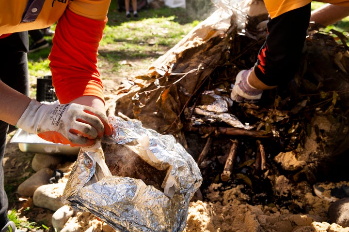 SYDNEY, AUSTRALIA - JULY 13: An earth oven is dug up at Hyde Park on July 13, 2019 in Sydney, Australia. NAIDOC Week celebrations are held across Australia each year to celebrate the history, culture and achievements of Aboriginal and Torres Strait Islander peoples. NAIDOC is celebrated not only in Indigenous communities, but by Australians from all walks of life. (Photo by Jenny Evans/Getty Images)