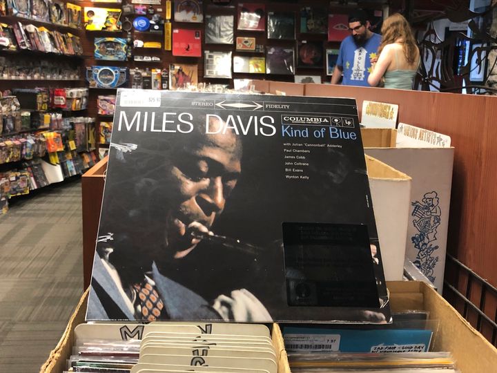 The Kind of Blue album cover is on display at Bull Moose record store in Portland, Maine, on the 60th anniversary of the album's release