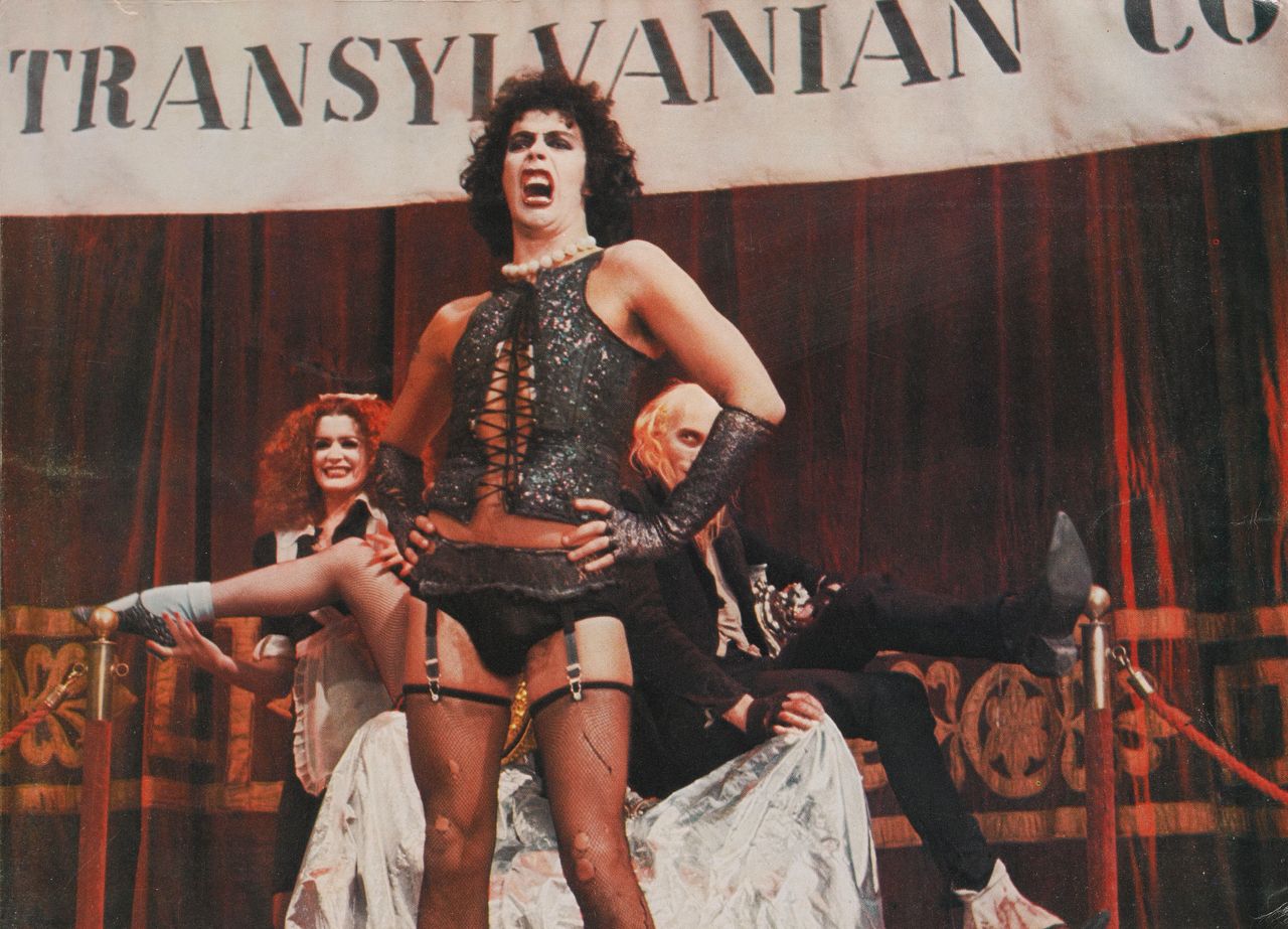 Tim Curry, backed by Patricia Quinn and Richard O'Brien, in "The Rocky Horror Picture Show."