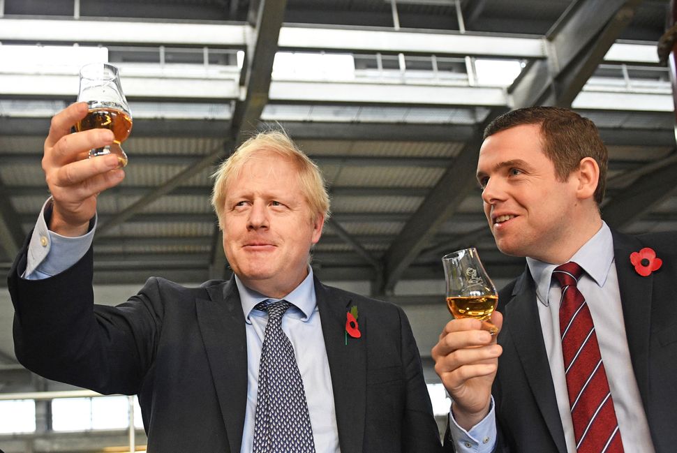 Johnson alongside Douglas Ross, who quit as a Scotland minister over Dominic Cummings' alleged breach of lockdown rules.