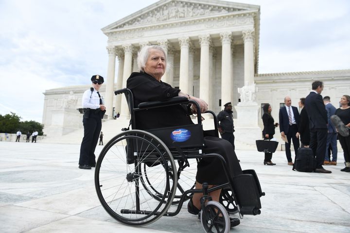 Transgender activist Aimee Stephens sits in her wheelchair outside the Supreme Court in Washington, D.C., October 8, 2019.