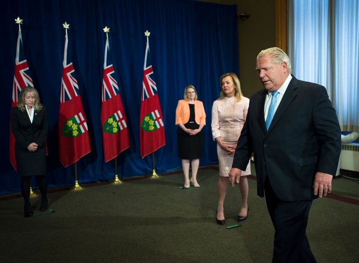 Ontario Premier Doug Ford leaves the podium after answering questions about a disturbing report from the Canadian military regarding COVID-19 outbreaks at Queen's Park in Toronto on May 26, 2020. 