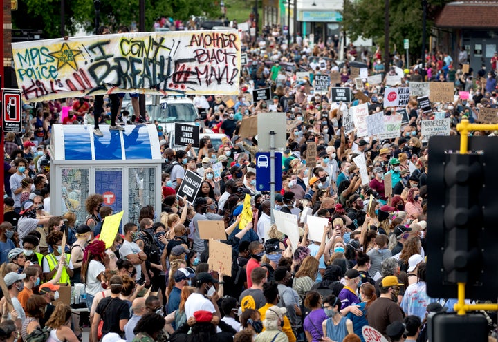 Protesters gather calling for justice for George Floyd on Tuesday, May 26, 2020, in Minneapolis. 