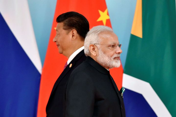 Chinese President Xi Jinping and Prime Minister Narendra Modi at the group photo session during the BRICS Summit in Xiamen, China September 4, 2017.