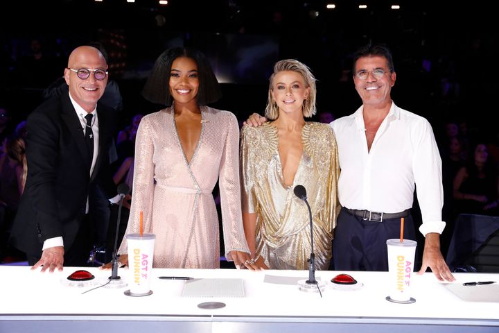 Howie Mandel (from left), Gabrielle Union, Julianne Hough and Simon Cowell at the "America's Got Talent" judging table.