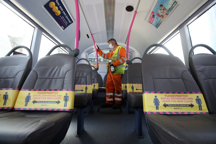 Cleaner James York from First Bus cleans a bus at the firm's Larbert depot ahead of the bus returning to service. Due to social distancing measures only a certain number of people will be able to travel on a particular bus after the introduction of measures to bring the country out of lockdown.