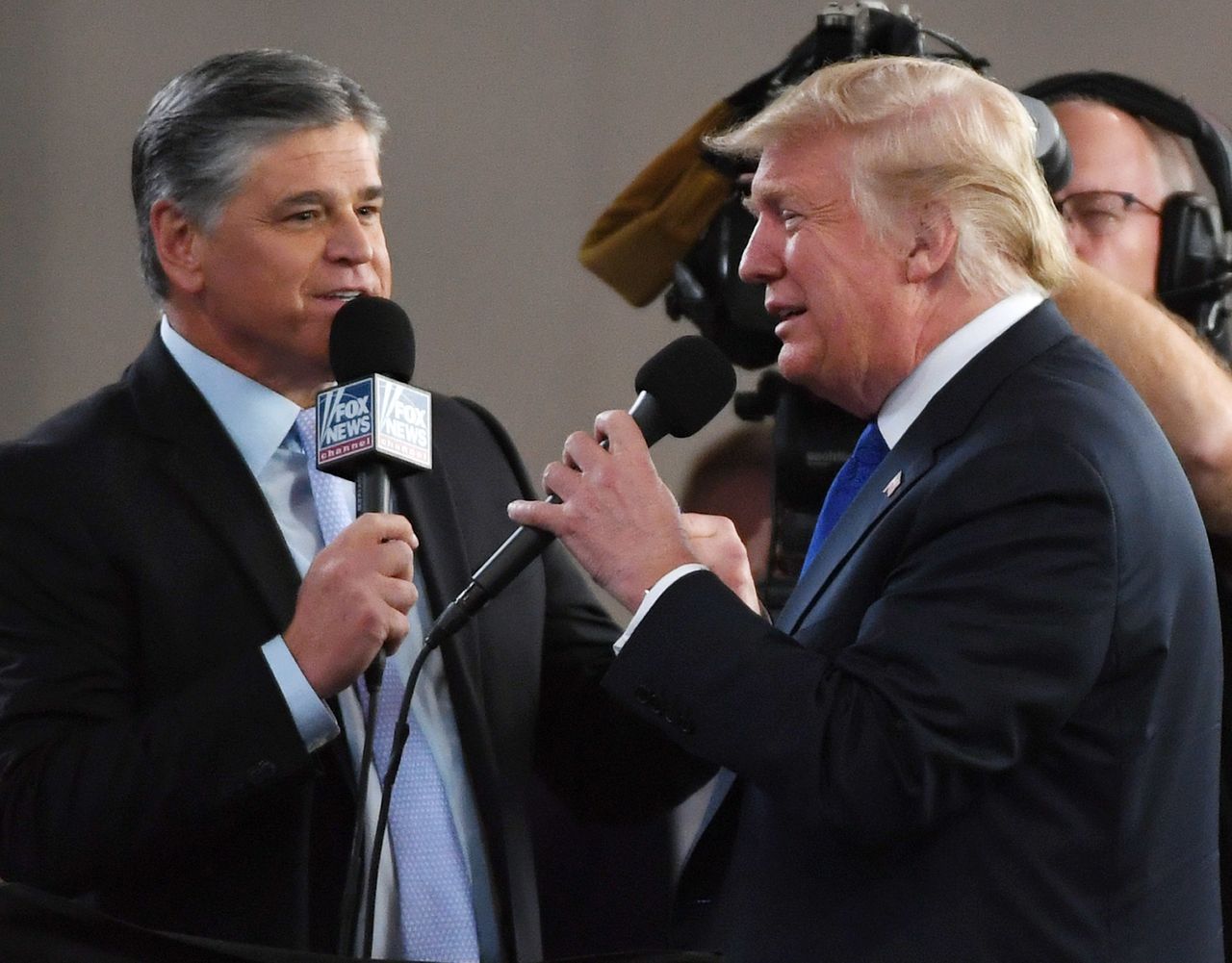 Fox News Channel and radio talk show host Sean Hannity interviews Trump before a campaign rally in 2018. Hannity has sycophantically defended Trump throughout the pandemic.