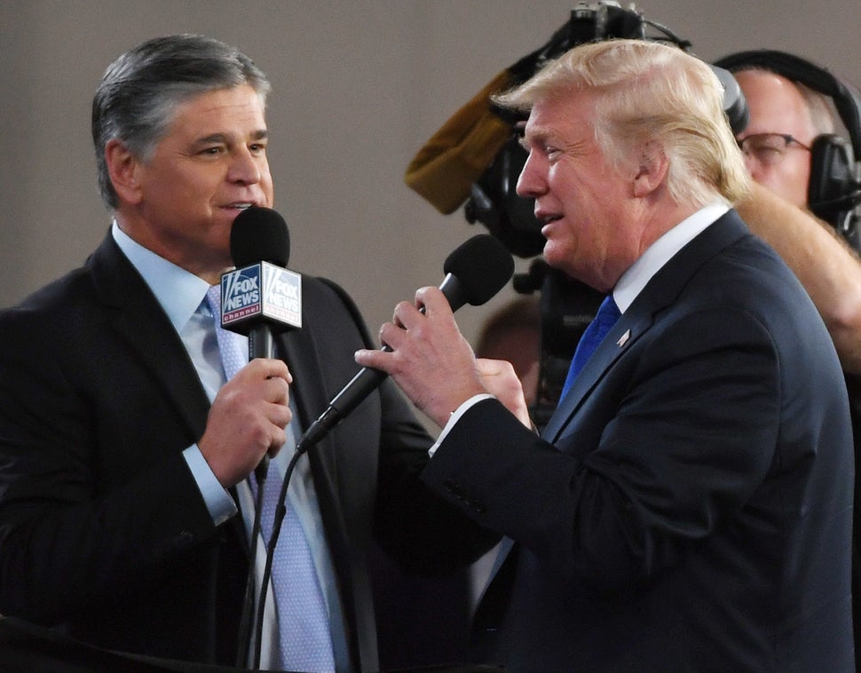 Fox News Channel and radio talk show host Sean Hannity interviews Trump before a campaign rally in 2018. Hannity has sycophan
