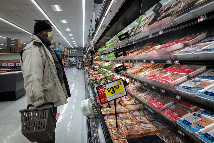 A man shops in the meat section at a grocery store in Washington, DC on April 28.