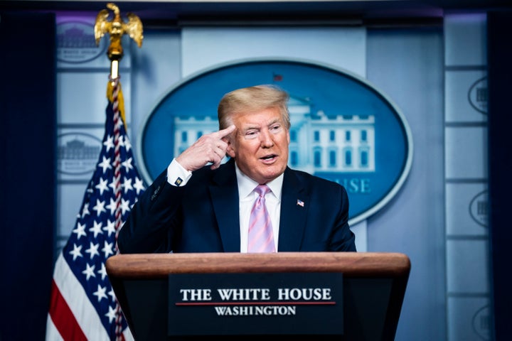 President Donald Trump speaks with members of the coronavirus task force in the James S. Brady Press Briefing Room at the White House on Friday, April 10, 2020.