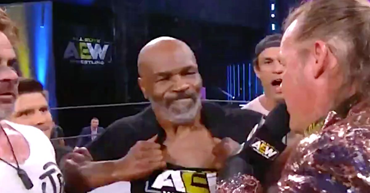 Mike Tyson Tries To Tear Off His Shirt And It Doesn't Go Well