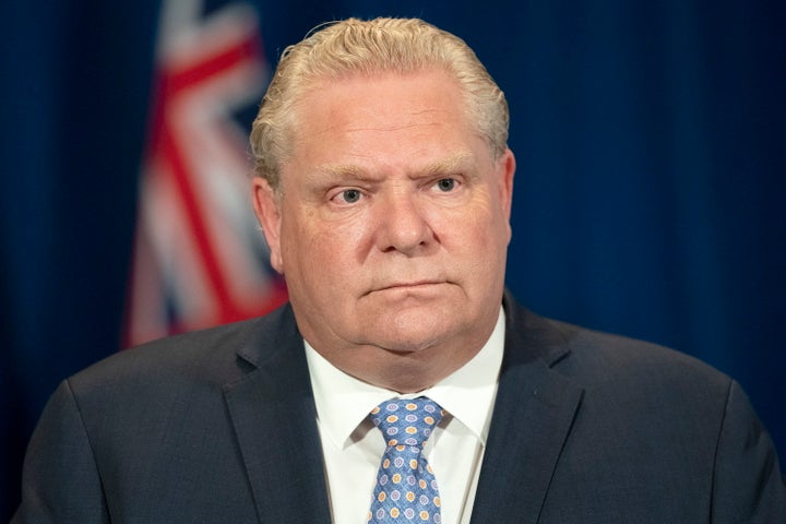 Ontario Premier Doug Ford listens to a question during his daily briefing on the COVID-19 pandemic at Queen's Park in Toronto on May 28, 2020.