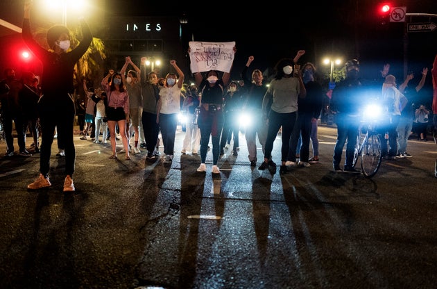 Demonstrators block traffic during a protest Wednesday in Los Angeles over the death of George Floyd...