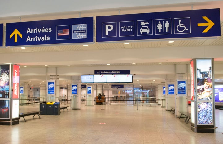 An empty arrivals hall at Montreal's Pierre Elliott Trudeau International Airport is seen on May 16, 2020. The pandemic has forced the shutdown of many businesses, including air travel.