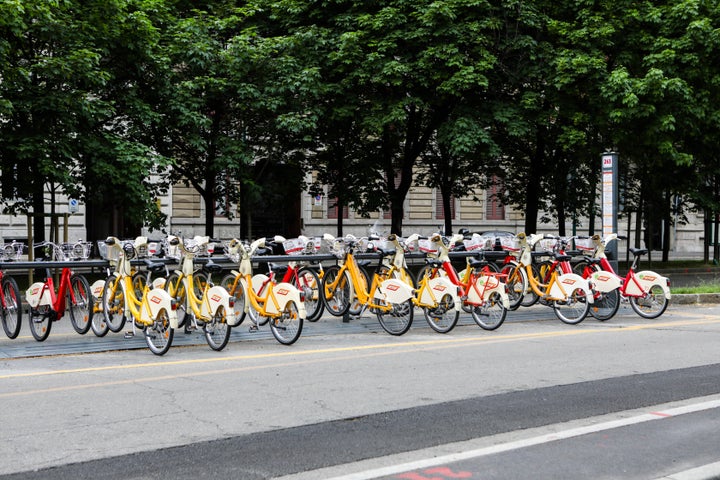 Electric bikes in Milan during lockdown. The bikes are part of the city's new sustainable mobility plan, which also foresees an increase in the number of bike lanes.