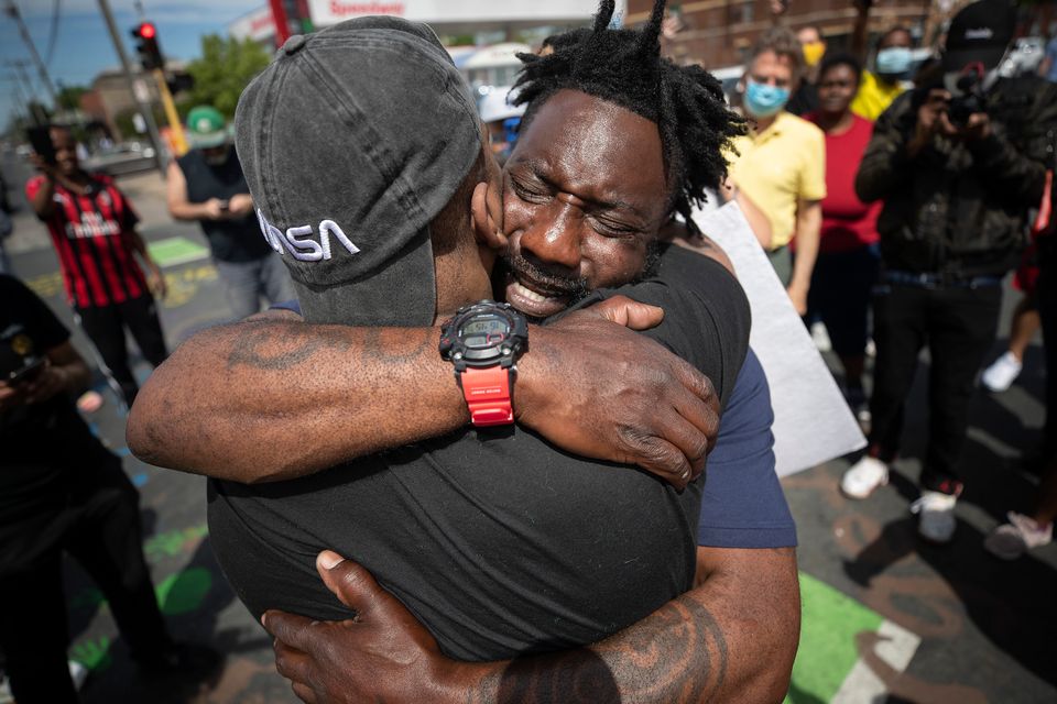 Former Minnesota Gopher and NFL football player Tyron Carter pleads with protesters not to tear up their city.