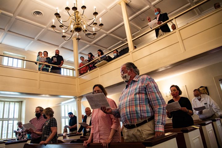Worshipers participate in a service at Hopeful Baptist Church on Sunday, May 17, in Montpelier, Virginia.