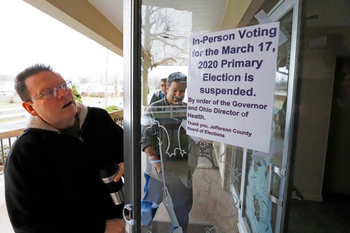 Jefferson County Elections workers arrive to pack up a polling place in Wintersville, Ohio, on March 17, 2020. Ohio's primary voting was postponed amid coronavirus concerns.