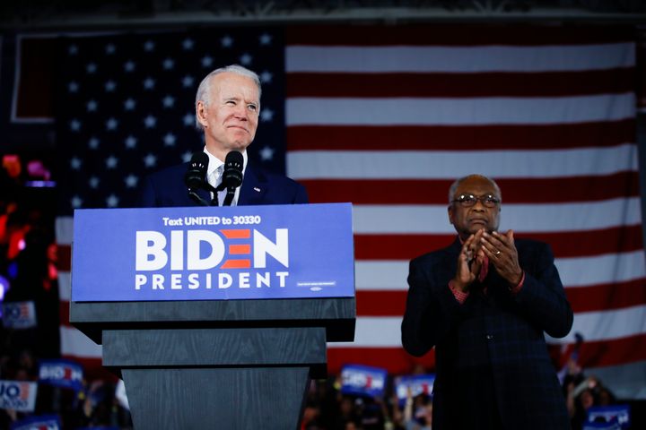 Democratic presidential candidate former Vice President Joe Biden, accompanied by South Carolina Rep. James Clyburn, speaks at a primary night election rally in Columbia, South Carolina, on Feb. 29, 2020. 
