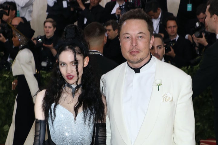 Grimes and Elon Musk attend the 2018 Costume Institute Benefit at Metropolitan Museum of Art on May 7, 2018, in New York City