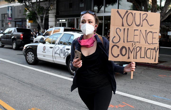 A demonstrator protests the death of George Floyd in Los Angeles on May 28, 2020.&nbsp;